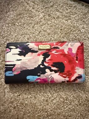 kate spade painted floral continental wallet in black, red, pink and blue